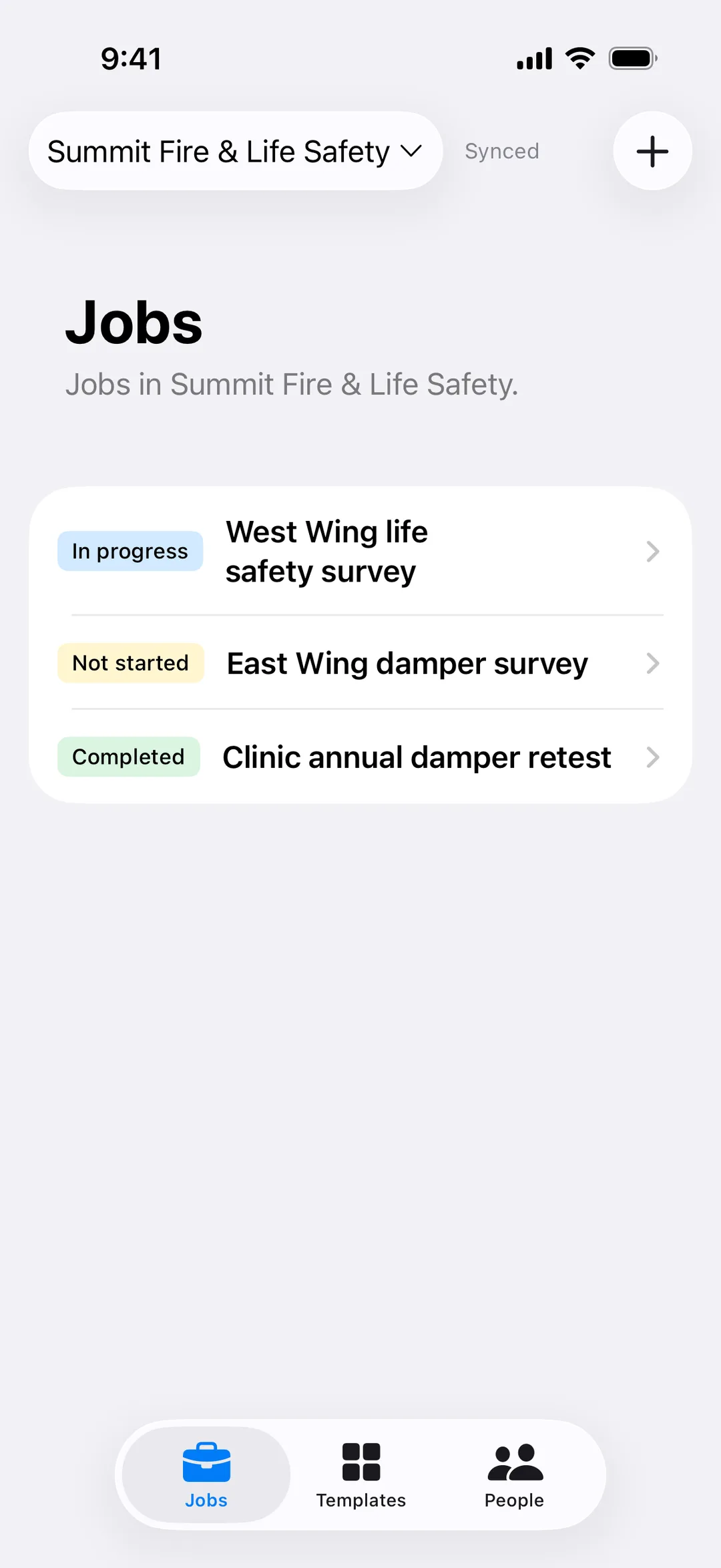 JobSat on iPhone: a fire and life safety contractor's jobs, each with its status.